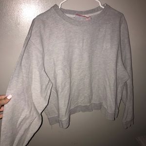 Light grey sweater with embroidery